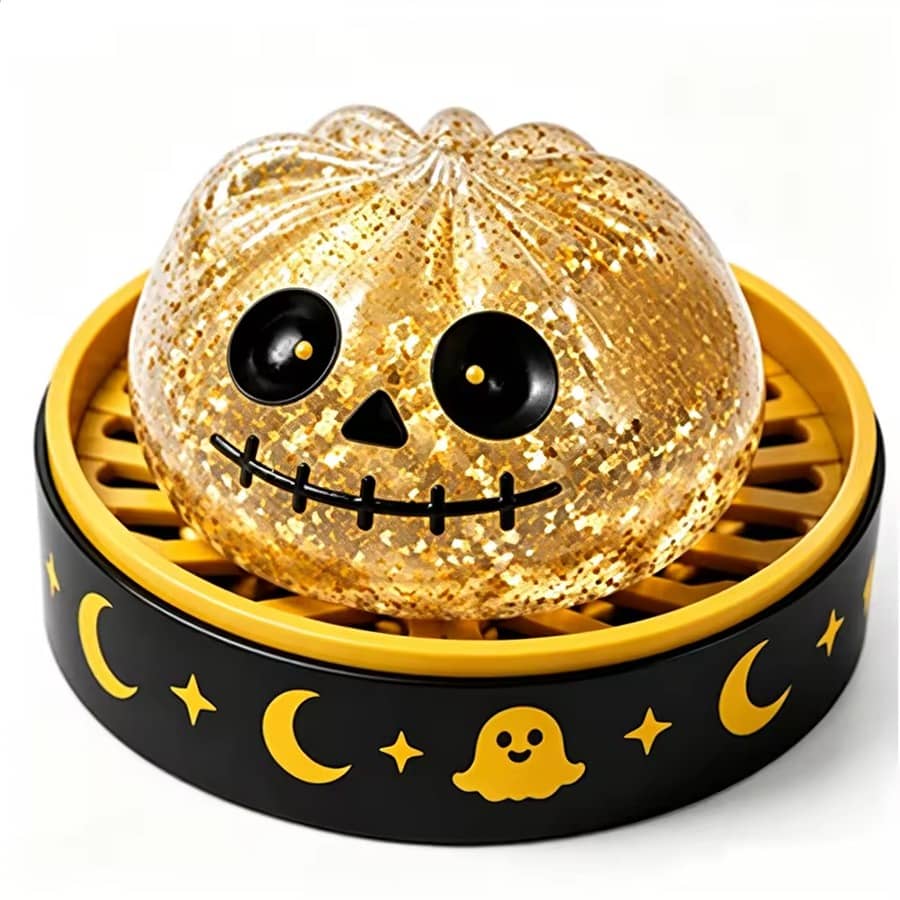 Skull dumpling, gold glitter jelly with a skull face
